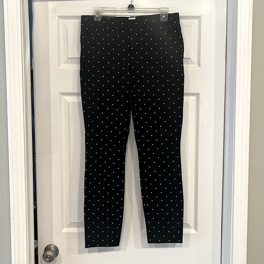 Black pants with white polka dots